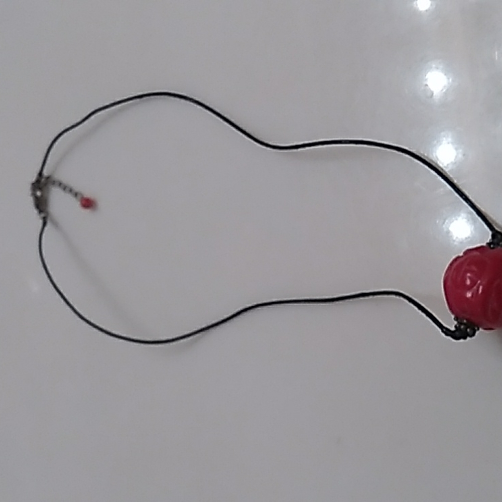 A CARVED RED TIWAN CORAL ROSE GEMSTONE. 925 STERLING SILVER & LEATHER CORD. SB25